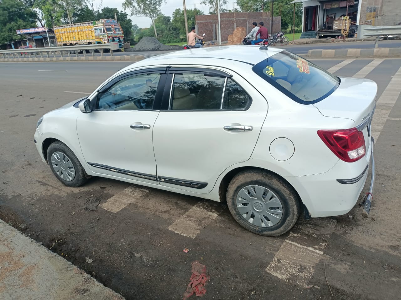 sanwariya-tour-travels-dzire-car.jpeg
